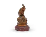 A bronze model of hare licking its paw by Auguste Cain, BRONZE, offered Jun 2023