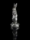 A silver coloured car mascot of a standing rabbit by Antoine Bofill, sculpture, sold Jun 2023