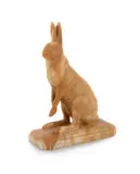 A carved siena marble model of a seated hare by Georges Gardet, sculpture, offered Jun 2023