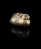 A polished brass rabbit paperweight by Irénée Rochard, sculpture, sold Jun 2023