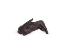 A bronze model of a sleeping rabbit by Peter Hayward, BRONZE, sold Jun 2023