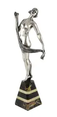 An Art Deco silvered bronze figure of a nude dancer by Henri Fugere, bronze, sold Nov 2023