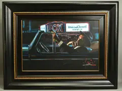 'Black and Classic II', a male figure in a classic car, smoking a by Fabian Perez, oil on canvas, sold Dec 2020