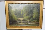(1870-1950), woodland lansdcape with stream flowing under a bridge, by Frederick William Reaveley, oil on board, sold Dec 2020