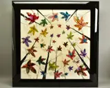 'Woodland Jewels VI', colourful leaves falling from trees, by Chloe Nugent, mixed media on board, sold Nov 2020