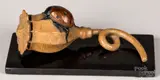 of a ladybug on a poppy seed pod by Tony Hochstetler, bronze, sold Jul 2022