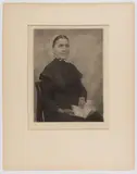 THE QUAKER NEW YORK PHOTOGRAPHIC PORTRAIT by Doris Ulmann, oil pigment print on tissue paper depicting a sitting woman in plain black dress, sold Dec 2023