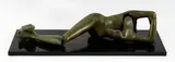 Nu couché by Laura Santini, Bronze à patine verte sur plaque de marbre, sold Aug 2022