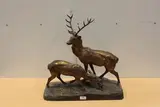 Cerf et biche by Jules Edmond Masson, Epreuve en bronze à patine et brune nuancée, sold Apr 2021