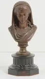 Buste de jeune fille by Eugène-Antoine Aizelin, Épreuve en bronze à patine brune nuancée, sur socle colonne en marbre noir, sold Sep 2025
