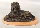 Lion couché by Paul Edouard Delabrierre, Bronze à patine brune (usures), sold Sep 2025