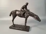 Jockey à cheval by Giuseppe Ferrari, Bronze à patine brune, sold Sep 2025