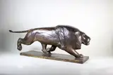 Lion Courant by Georges Lucien Guyot, Epreuve en bronze à patine brun clair nuancé, sold Nov 2015