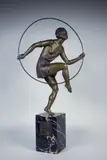 Femme au cerceau by Emile Adolphe Monier, Epreuve en bronze à patine brun nuancé, sold Oct 2015