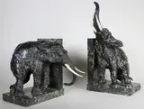 Serres-livre aux éléphants by Ary Bitter, Epreuve en bronze, ivoire et marbre vert, sold Jun 2015