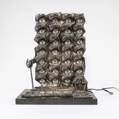 Die surrealistischen Augen by Salvador Dalí, 1980, bronze, sold Mar 2024