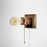 Sconce by Frank Lloyd Wright, c. 1915, copper-plated brass, sold Jan 2023