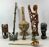 including an African Senufo Chieftain's pipe, the wooden shaft set by Items Of Ethnographic Interest, bronze, sold Jan 2024