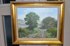 A British landscape with a thatched cottage beside a cart by Lesley Hammett, oil on canvas, sold Nov 2020