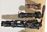 carved hardwood figure of a woman surrounded by men and women 46cm high, carved by Native Art Interest, sculpture, sold Oct 2020