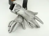 Belt with buckle in the form of two rams heads by Guy Taplin, Cast white metal buckles with leather straps, sold Dec 2019