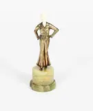 Lady in Pantaloons a cold painted bronze and ivory figure by Josef Lorenzl, bronze and ivory, offered Oct 2019