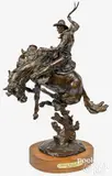 cowboy on horseback by Grant Speed, bronze, sold Apr 2022