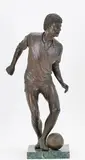 The Runner by Charles Parks, Bronze sculpture of a soccer player, sold Sep 2025