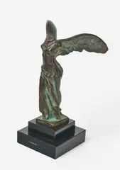 Winged Victory of Samothrace by Max Le Verrier, bronze with applied patina on stone base, sold Jan 2021