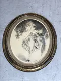 Jeune fille au perroquet by Louis Icart, Lithographie en couleurs, à vue ovale, sold Jun 2021