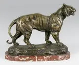 Tigre marchant by Charles Valton, Epreuve en bronze à patine or nuancé réhaussé de noir, sold Nov 2014