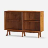 Bookcase from the College of Fine Art, Chandigarh by Pierre Jeanneret, c. 1960, teak, glass, sold Jan 2023