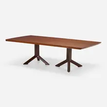 Dining table by Edward Wormley, c. 1967, walnut, mahogany, sold Jan 2023
