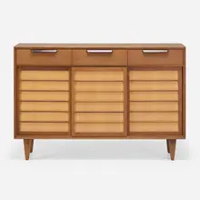 Cabinet by Edward Wormley, c. 1953, walnut, maple, pine, leather, sold Jan 2023
