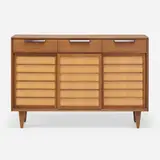 Cabinet by Edward Wormley, c. 1953, walnut, maple, pine, leather, sold Jan 2023