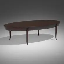 Coffee table by T. H. Robsjohn-Gibbings, c. 1955, walnut, sold Jan 2023