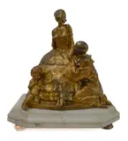 An early 20th century gilt-bronze sculpture model: a Pierrot kneeing by Josef Lorenzl, bronze, sold Feb 2023
