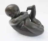 An interesting bronze sculpture of a nude male infant by Hermann Lickfeld, bronze, sold Jan 2023