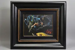 BLACK AND CLASSIC' a portrait study of a male figure sitting in a classic car at night by Fabian Perez, oil on canvas, sold Aug 2020