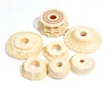 Seven ornamentally turned ivory bell-push stands by Gertrude Eleanor Crawford, sculpture, offered Jul 2019