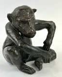 Singe assis by Bernard de Souzy, Bronze à patine marron, sold Jan 2025