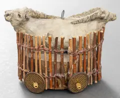 Double Bull Figure Rattle Sculpture by Immi C. Storrs, mixed media rattle in the form of a carriage, sold Feb 2024