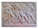 A carved marble relief 'dancing figures' by Thomas Whalen, sculpture, sold Nov 2022