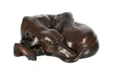 A bronze limited edition model of a recumbent whippet by Jonathan Wylder, BRONZE, sold Nov 2022