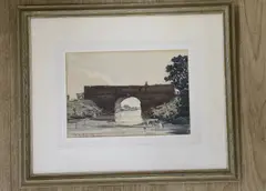 Figure on a stone bridge by Claude Muncaster, 1920, ink and watercolour, offered Jun 2023