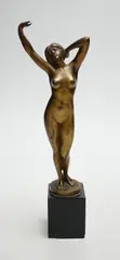 A gilt bronze figure of a stretching female nude by Robert Rudolfi, bronze, sold May 2023