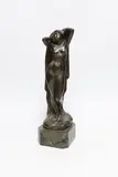 A standing female nude female, on marble base by Eugen Schlipf, sculpture, sold Apr 2023