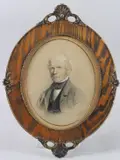 Bust length portrait of a gentleman, charcoal and coloured crayons by William Huggins, charcoal and coloured, offered May 2025