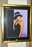 'Lavender Wall, Matching Hat', a portrait of a female figure wearing a by John Mould, pastel on paper, sold Jun 2020