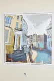 A CURVE OF BLUE AND YELLOW' a row of houses painted in pastel tones by Camilla Dowse, pastel, sold May 2020